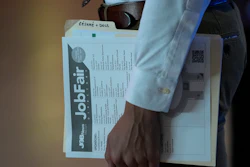 A person in a line at a job fair in Sunrise, Fla., Aug. 29, 2024.