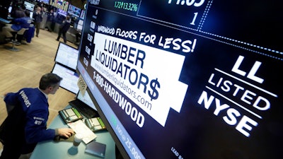 Specialist Anthony Rinaldi works on the floor of the New York Stock Exchange, Feb. 1, 2016.