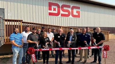 DSG ribbon-cutting event with President and CEO Paul Kennedy (center), Box Elder Mayor Larry Larson, Box Elder Chamber of Commerce President Sandy Larson (left), and members of the DSG South Dakota team, Box Elder, S.D.