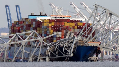 The cargo ship Dali stuck under part of the Francis Scott Key Bridge near Pasadena, Md., March 26, 2024.