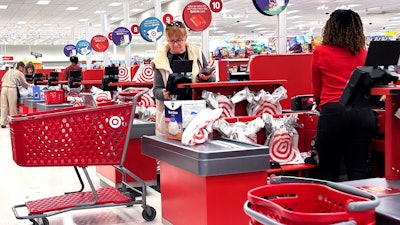 A shopper checks out at a Target in Glenview, Ill., Oct. 27, 2024.