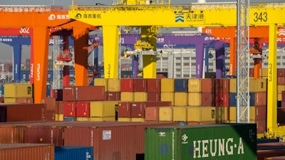 Shipping containers stacked at a port, Tianjin, China, Jan. 16, 2023.