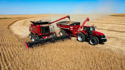 Jason Kwapi operates a combine during soybean harvesting on the Voss farm near Palo, Iowa, Oct. 2, 2024.