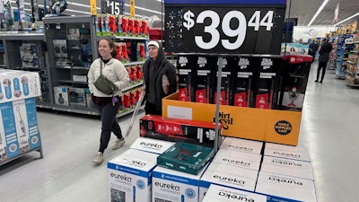People shop for Black Friday deals at a Walmart store in Rochester, New York, Nov. 29, 2024.
