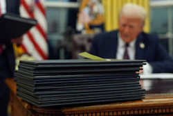 President Trump signs executive orders in the Oval Office of the White House, Jan. 20, 2025.