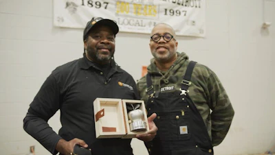 Matthew Bracey (left), Construction Trades Masonry Program manager at Randolph Career and Technical Center in Detroit, and Carhartt SVP of Inclusion, Sustainability and Community Todd Corley.