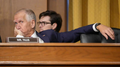 Sen. Thom Tillis, R-N.C., listens as U.S. Trade Representative Jamieson Greer testifies before the Senate Finance Committee, Washington, April 8, 2025.