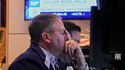 Trader Thomas McCauley on the floor of the New York Stock Exchange, April 21, 2025.
