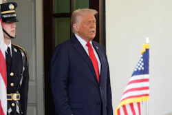 President Donald Trump waits to greet El Salvador's President Nayib Bukele at the White House, Monday, April 14, 2025, in Washington.