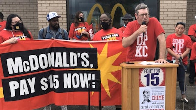 Richard Eiker speaks in support of a strike by fast food workers outside a McDonald's restaurant, Kansas City, Mo., May 19, 2021.
