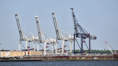 Container cranes sit idle at the port of New York & New Jersey, Bayonne, N.J., May 12, 2025.