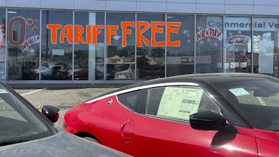 A 'Tariff Free' sign at an automobile dealership in Totowa, N.J., April 30, 2025.
