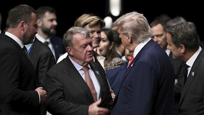 President Donald Trump and Denmark's Foreign Minister Lars Lokke Rasmussen before the start of a plenary session of the NATO Heads of State and Government summit, The Hague, Netherlands, June 25, 2025.