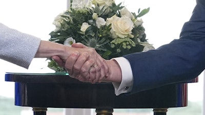 President Donald Trump and European Commission President Ursula von der Leyen shake hands, Turnberry, Scotland, July 27, 2025.