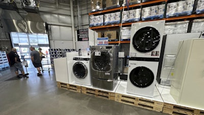 Washers displayed near the entrance to a Costco warehouse, July 8, 2025, Sheridan, Colo.