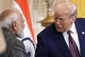 President Donald Trump, right, speaks with India's Prime Minister Narendra Modi during a news conference in the East Room of the White House, Feb. 13, 2025, in Washington.