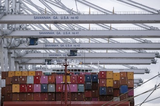 A vessel is loaded with containers at the Georgia Ports Authority's Port of Savannah Garden City Terminal, Oct. 21, 2021, Savannah, Ga.