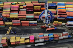 Containers are piled up in a cargo terminal in Frankfurt, Germany, Aug. 1, 2025.