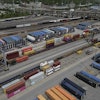 Shipping containers are loaded onto trucks at CSX Queensgate Rail Yard, May 7, 2025, Cincinnati.
