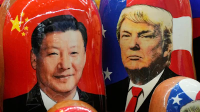 Russian Matryoshka dolls depicting China's President Xi Jinping and President Trump at a souvenir shop in St. Petersburg, Nov. 21, 2024.