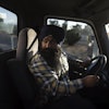 Prahb Singh maneuvers his truck at a gas station in Fontana, Calif., Sept. 3, 2025.
