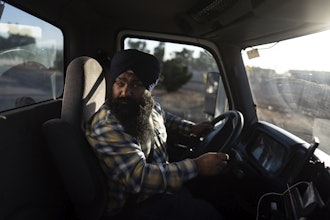 Prahb Singh maneuvers his truck at a gas station in Fontana, Calif., Sept. 3, 2025.