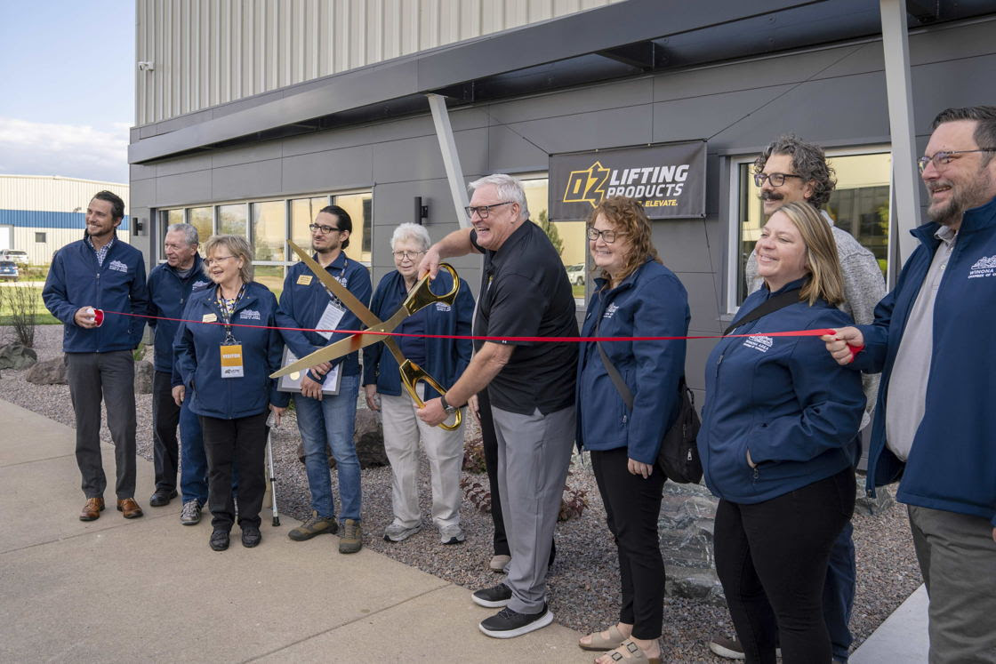 OZ Lifting President Steve Napieralski prepares to cut the ribbon at the company's new facility, Oct. 7, 2025, Winona, Minn.