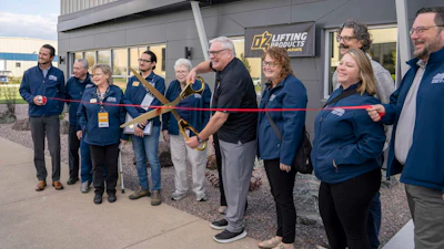 OZ Lifting President Steve Napieralski prepares to cut the ribbon at the company's new facility, Oct. 7, 2025, Winona, Minn.