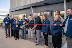 OZ Lifting President Steve Napieralski prepares to cut the ribbon at the company's new facility, Oct. 7, 2025, Winona, Minn.