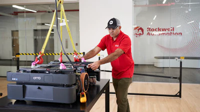 A worker at Rockwell Automation headquarters in Milwaukee assembling the OTTO 600.