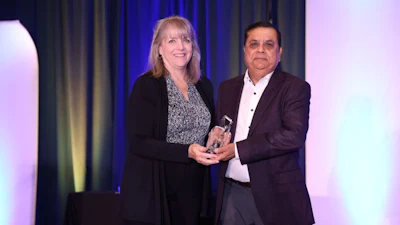 Ajay Bajaj of Rotator Products Limited receives the 2025 Warren Pike Award from PTDA EVP and CEO Ann Arnott during the PTDA Industry Summit, Oct. 24, 2025, San Antonio, Texas.