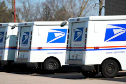 U.S. Postal Service trucks outside a post office, Jan. 29, 2024, Wheeling, Ill.