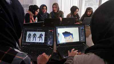 Afghan coders practice at the Code to Inspire computer training center in Herat province, western Afghanistan, Jan. 22, 2018.