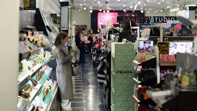 People shop at the Somerset Collection mall, Wednesday, Dec. 10, 2025, in Troy, Mich.