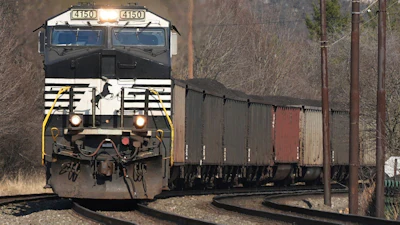 A Norfolk Southern freight train passes through Homestead, Pa., March 12, 2025.