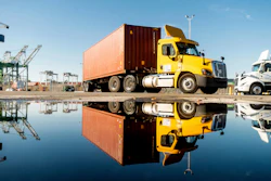 truck departs from a Port of Oakland shipping terminal on Nov. 10, 2021, in Oakland, Calif.
