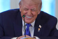 President Donald Trump laughs during a meeting with oil executives in the East Room of the White House, Jan. 9, 2026, Washington.