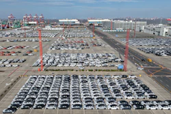 Aerial view of new cars waiting for shipment at a port in Shanghai, Jan. 14, 2026.