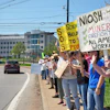 People rally on Wednesday, April 23, 2025.