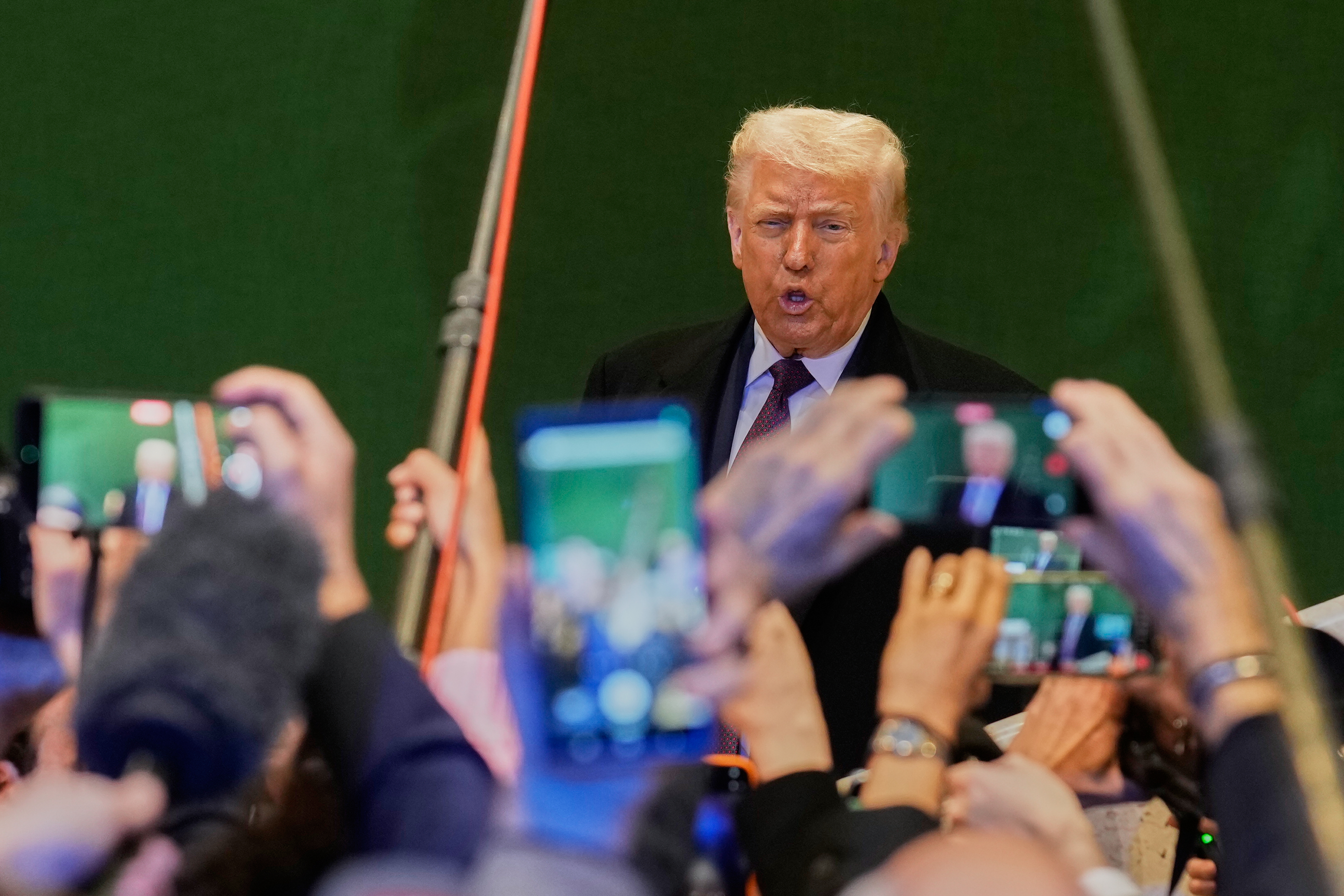 US President Donald Trump talks to media during the Annual Meeting of the World Economic Forum in Davos, Switzerland, Thursday, Jan. 22, 2026. ()