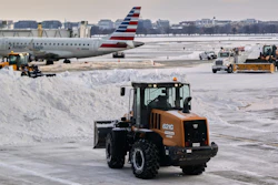 Snow and ice is cleared at Ronald Reagan Washington National Airport, Jan. 26, 2026, Arlington, Va.