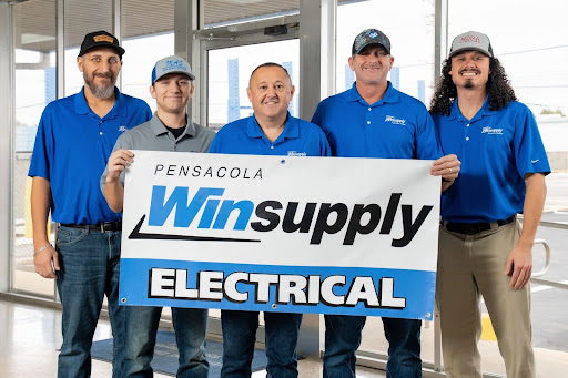 Pensacola Winsupply President Trampas Miller (center) along with, from left, the late Donald Chase, Cody Gavin, James Eliason and Terrant Endresen.