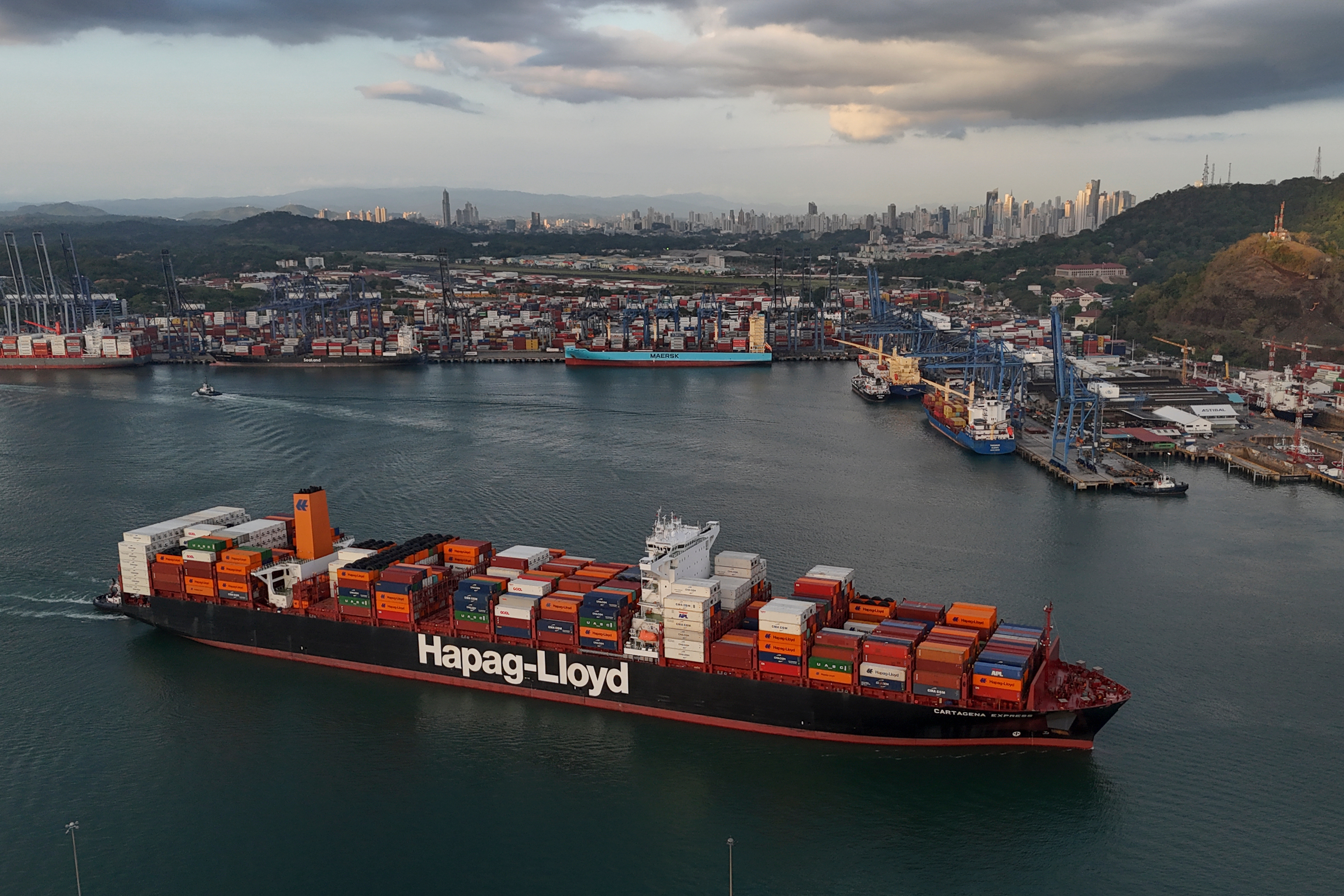 A cargo ship sails past the Panama Canal's Port of Balboa, managed by CK Hutchison Holdings, Panama City, March 13, 2025.