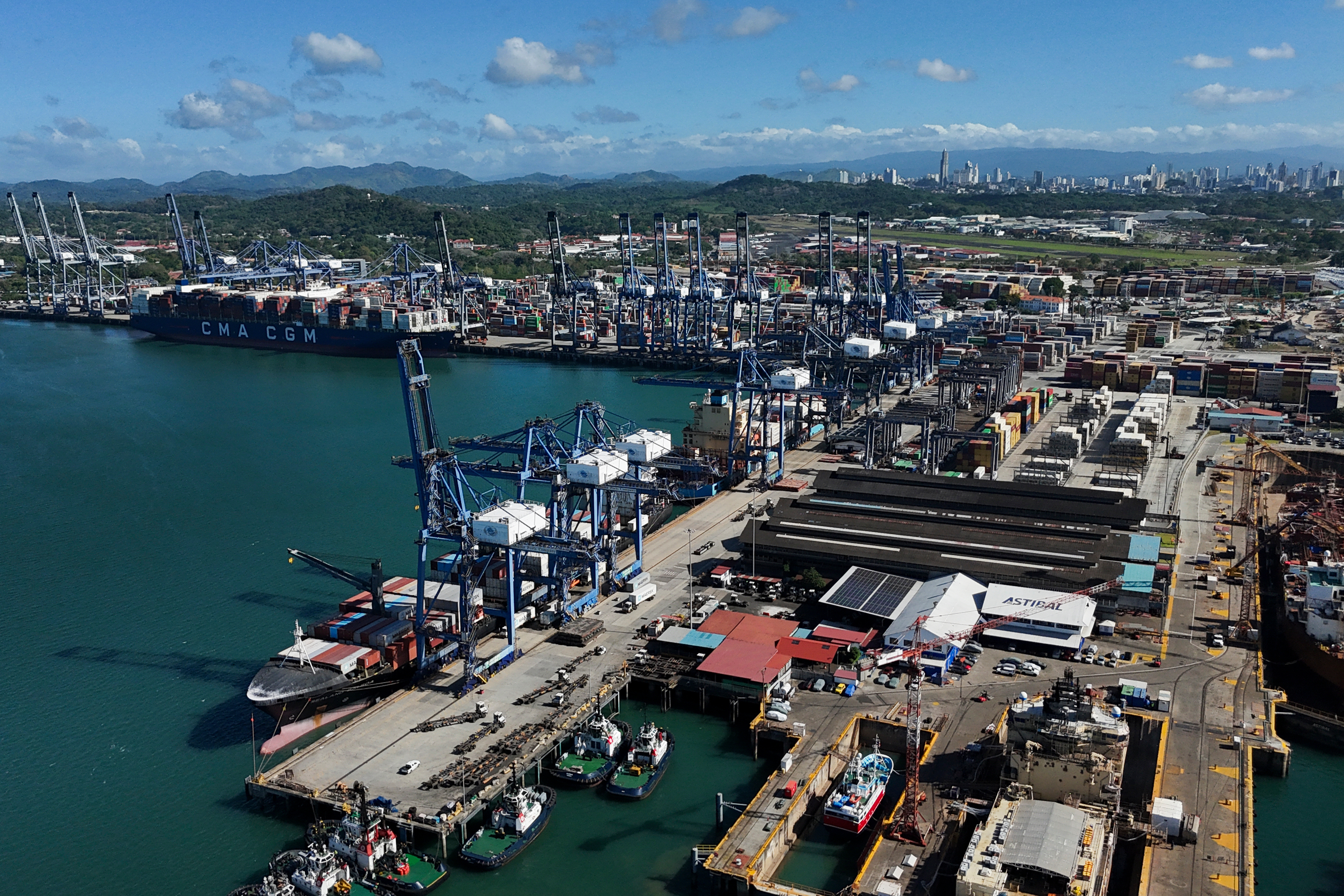 Cranes load a cargo ship at the Panama Canal's Port of Balboa, Panama City, Jan. 30, 2026.