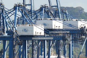 Cranes load a cargo ship at the Panama Canal's Port of Balboa, Jan. 30, 2026.
