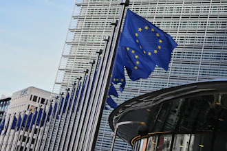European Union flags outside of EU headquarters in Brussels, Nov. 4, 2025.