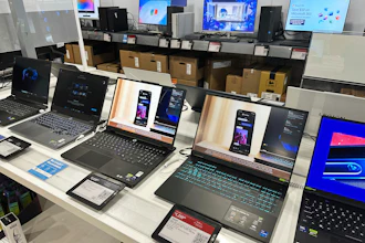 Laptop computers at a retail store in Vernon Hills, Ill., Aug. 7, 2025.