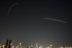 The Israeli air defense system fires to intercept missiles during an Iranian attack over Tel Aviv, March 3, 2026.