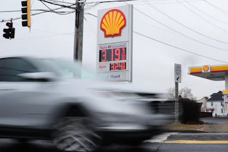 Fuel prices are displayed at a gas station, March 4, 2026, Baltimore.