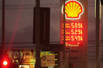 Gas prices are displayed at a gas station in Los Angeles, March 9, 2026.